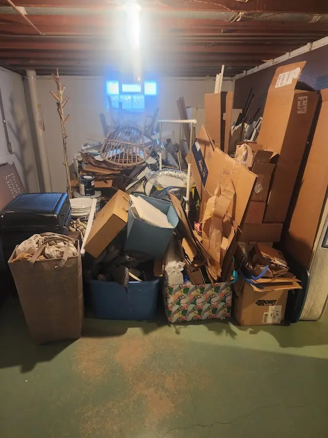 Roll-off dumpster container at job site for 2 Yard Dumpster Rental in Aloha